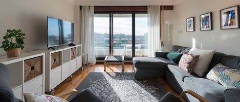 A comfortable and sunny living room with an amazing balcony for a lovely stay #airbnb #airbnbporto #portugal #pt #porto #sunny #comfortable #lovelystay