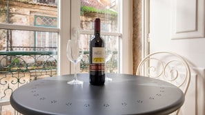 Grab a cup, relax and enjoy one of Portugal's specialty, a lovely and tasty wine by the good view of Lisbon #airbnb #airbnblisbon #portugal #pt #lisbon