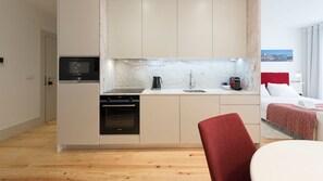 Modern fully equipped kitchenette in an open space with the appliances needed for a warm and delicious meal #airbnb #airbnbporto #portugal #pt #porto