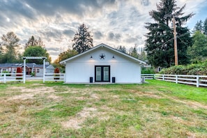 Modern barn with fenced in area