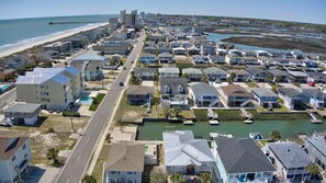 Home is one block from the beach.