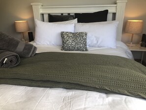 Two doonas, electric blanket heater and fan avail