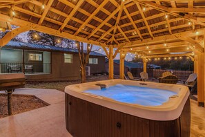Private Hot Tub Retreat – Relax in the large hot tub with twinkling lights
