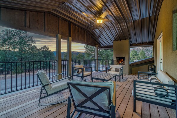 Expansive Outdoor Deck – Unwind by the outdoor fireplace with plenty of seating