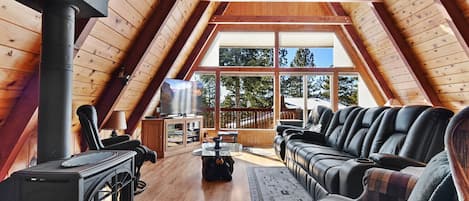 Living room with TV, and fireplace