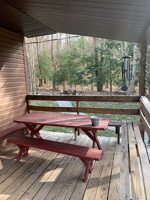 outdoor dining on covered front porch