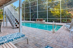 Heated pool with recliners
