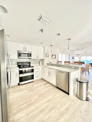 Beautiful updated kitchen, open to dining room with gulf views.  