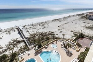 Pool area, private board walk and the white sandy beach.