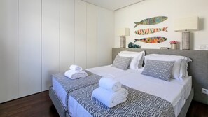 Second bedroom with 2 single and comfortable beds, each one with its own linen #comfortable #porto #portugal #airbnbporto