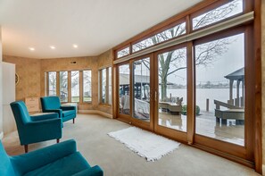 Four Seasons sunporch with sweeping lake views.