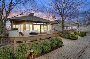 Back Deck with fire-pit and outdoor grill with plenty of seating for your group.