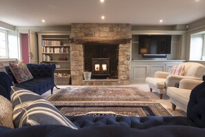 Ground floor: Sitting room with wood burning stove