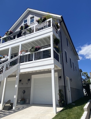 Side door access to garage and interior stairwell 