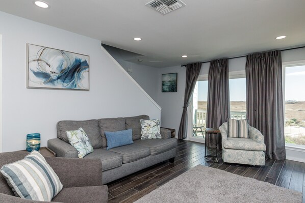 Chic and cozy gathering space, the perfect ambience for unwinding after a day of fun in the sun