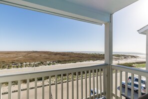 Private balcony off master bedroom with partial beach view