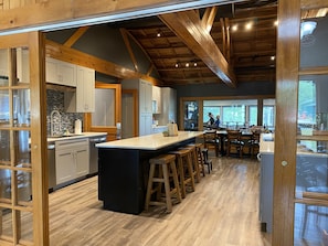 An stunning 10’ island, 2 dishwashers, 2 refrigerators, and a coffee bar.