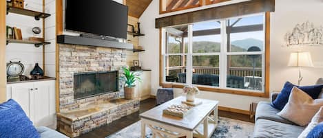 Vaulted ceiling enhance the space and comfort of this modest cabin. 