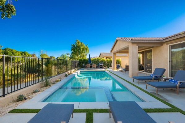 Backyard Poolside view of golf course and ponds