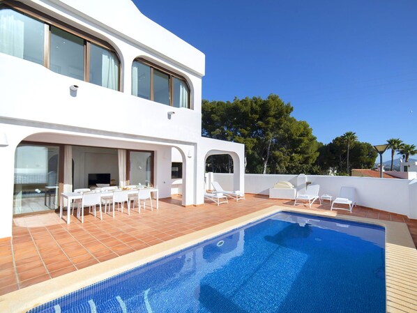Water, Sky, Property, Swimming Pool, Building, Azure, Outdoor Furniture, Shade, House, Body Of Water