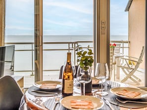Furniture, Chair, Sea, Table, Kitchen & Dining Room Table, Ocean, Restaurant, Glass, Coast, Resort