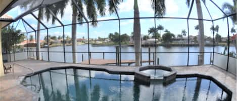 WATERFRONT-GULF ACCESS 4 bedroom 3 bath, heated POOL & SPA. AMAZING VIEW. 