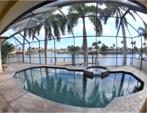 WATERFRONT-GULF ACCESS 4 bedroom 3 bath, heated POOL & SPA. AMAZING VIEW. 