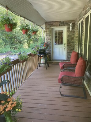 The front porch includes a small BBQ and great views for your enjoyment!