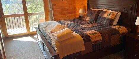 Upper-level King Bedroom with Private Juliette Deck and Long Range Mountain Views