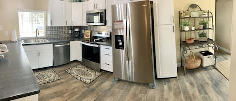 Spacious kitchen that overlooks the open floorplan