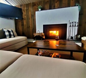 Enjoy a relaxing glass of wine by the warm fire!