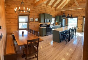 Large kitchen and dining area with plenty of seating - Ember Hills Lodge