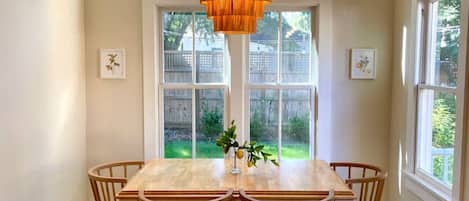 Seating for 6 in the bright breakfast nook with a view