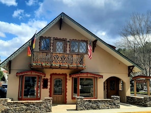 Front view of Chalet Munich above retail store