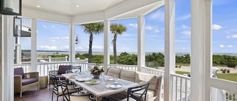 Enjoy the Incredible Ocean Views while eating appetizers on the screened porch.