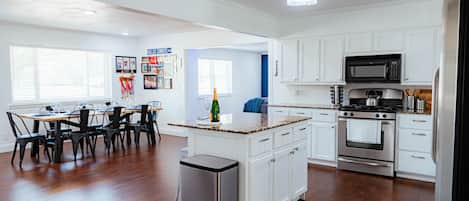 Open concept kitchen and dining.