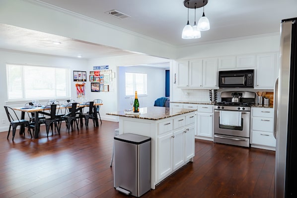 Open concept kitchen and dining.