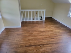 refinised wood floors upstairs bedroom