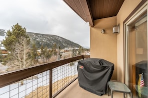 Private balcony view with gas grill.