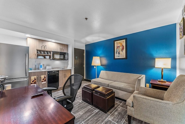 Check out the living room work and play space. Couch folds out into a bed. Everything new and remodeled.