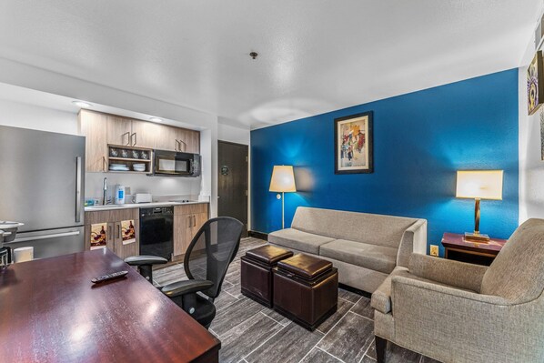 Check out the living room work and play space. Couch folds out into a bed. Everything new and remodeled.