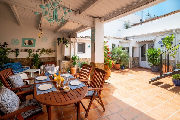 Dine and relax outside either under cover or on the roof terrace