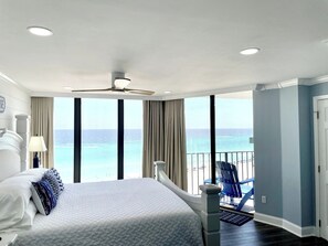 Waterfront bedroom with a king bed