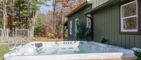 Private and remote hot tub off of rear deck