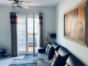 Living Room Sofa and Patio Doors