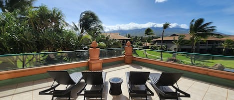 Lounge chairs and table with Champagne Ice Bucket