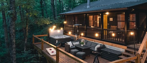 Relax under the trees on the large outdoor deck