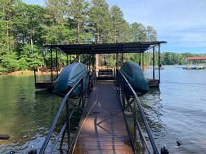 Enjoy your own private dock during your stay. Canoes avail. for rent if wanted.