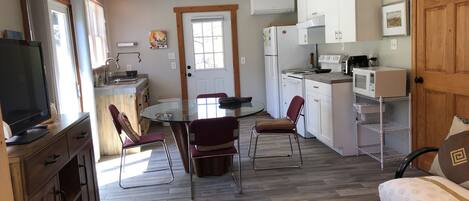 From bed and TV area looking toward Kitchen