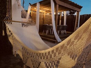 Enjoy a night swinging in our handmade hammock.